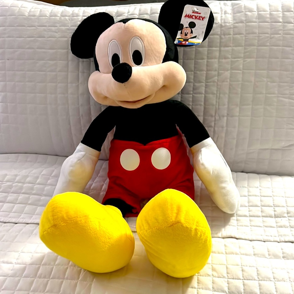 New with tag - a little over 2’ stuffed Mickey Mouse!